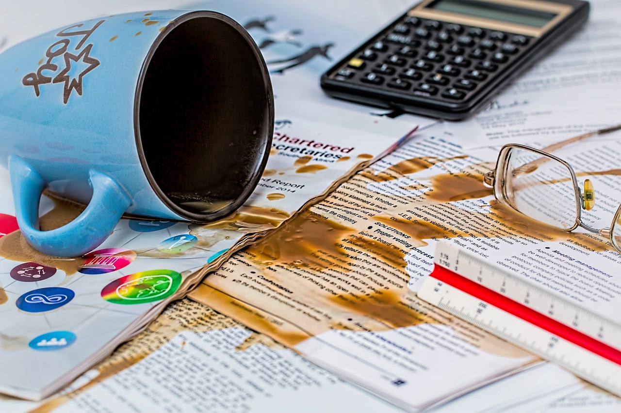 Coffee that spilled on papers